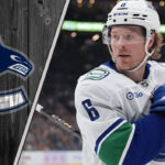 Boeser Bombshell: Will the Vancouver Canucks Risk Losing Their Star? – NHL Rumors Vancouver Canucks winger Brock Boeser looking concerned during a game.