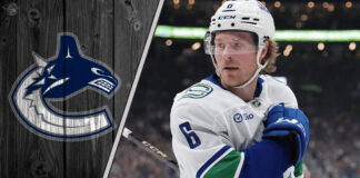 Vancouver Canucks winger Brock Boeser looking concerned during a game.