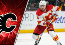 Calgary Flames defenseman Rasmus Andersson skates during an NHL game amid trade rumors