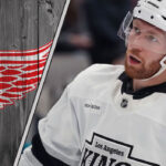 Detroit Red Wings logo with Vladislav Gavrikov skating on the ice - NHL trade rumors