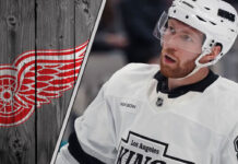 Detroit Red Wings logo with Vladislav Gavrikov skating on the ice - NHL trade rumors