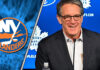 Brendan Shanahan in a suit, with the Toronto Maple Leafs logo subtly blurred in the background, facing a New York Islanders logo.