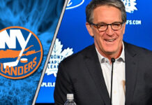 Brendan Shanahan in a suit, with the Toronto Maple Leafs logo subtly blurred in the background, facing a New York Islanders logo.