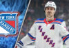 New York Rangers forward Chris Kreider skating in his blue jersey, amidst NHL trade rumors.
