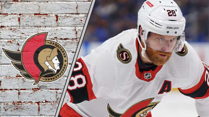 Ottawa Senators forward Claude Giroux skates with the puck, focused on the play, amidst ongoing contract extension discussions.