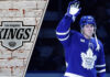 Toronto Maple Leafs forward Mitch Marner skates with the puck, amidst swirling trade rumors connecting him to the LA Kings.