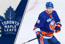 Noah Dobson in a New York Islanders jersey, with a faint Toronto Maple Leafs logo superimposed, symbolizing NHL trade rumors.