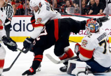 Action shot from the NHL playoff series between the Florida Panthers and Carolina Hurricanes in May 2025.