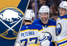 Buffalo Sabres teammates celebrating a goal as NHL Rumors swirl about the team trading the #9 overall pick.