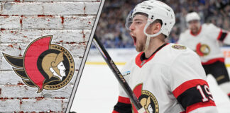 Ottawa Senators forward Drake Batherson skates with the puck during an NHL game, with a focused expression.