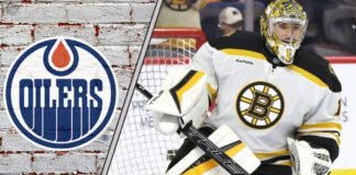 An image of Jeremy Swayman in his Boston Bruins gear, looking focused during a game, with the Edmonton Oilers logo faintly in the background, suggesting a potential trade.
