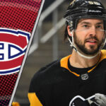 Photo of Kris Letang guiding the puck for the Pittsburgh Penguins amid swirling 2025 NHL trade rumors