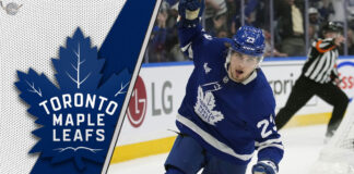 Matthew Knies celebrating a goal in his Toronto Maple Leafs jersey during the 2024-25 NHL season.