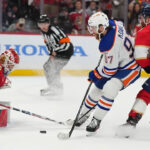 Claws Out or Oil Surge? How to Watch Panthers vs Oilers Game 3 of the Stanley Cup Final! The Florida Panthers and Edmonton Oilers clash dramatically on the ice, symbolizing the intense battle for the Stanley Cup in Game 3.