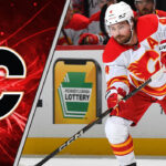 Where There’s Smoke, There’s Fire: Unpacking the Rasmus Andersson Trade Rumors Calgary Flames defenseman Rasmus Andersson looks on during an NHL game, with NHL trade rumors circulating about his future with the team.