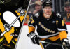 Sidney Crosby of the Pittsburgh Penguins skates with the puck during an NHL game, looking to make a play.