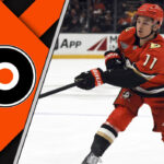 Trevor Zegras Trade: Expert Analysis on the Flyers’ Bold Move and the Ducks’ New Direction An action shot of Trevor Zegras in his Anaheim Ducks uniform, stickhandling the puck with intensity before his trade to the Philadelphia Flyers.