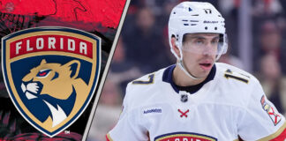 Florida Panthers forward Evan Rodrigues skates during an NHL game, the subject of recent NHL rumors.