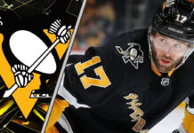 Pittsburgh Penguins forward Bryan Rust skates during an NHL game, with NHL trade rumors swirling around his future with the team.