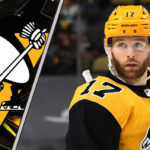 Pittsburgh Penguins forward Bryan Rust looking on in an NHL game wondering if he will be traded? - July 28, 2025