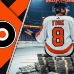 Flyers Go All-In on Cam York: A $25.75 Million Bet on Untapped Potential Philadelphia Flyers defenseman Cam York sitting on a pile of money at center ice after signing a new contract.