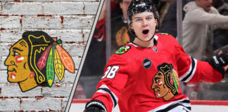 Chicago Blackhawks star Connor Bedard celebrating a goal and wondering about his next contract with the Chicago Blackhawks
