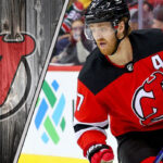 New Jersey Devils defenseman Dougie Hamilton looks on during an NHL game amid swirling NHL trade rumors.