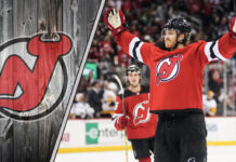 New Jersey Devils defenseman Dougie Hamilton celebrates a goal during an NHL game, amidst recent NHL trade rumors.