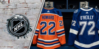 The backs of Isaac Howard's #22 Edmonton Oilers jersey and Sam O'Reilly's #72 Tampa Bay Lightning jersey hang side-by-side in an NHL locker room stall, symbolizing the recent trade.