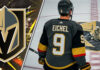 A hockey player in a Vegas Golden Knights jersey with the name Eichel and the number 9 on the back stands at center ice, looking at the team logo which is covered in stacks of money.
