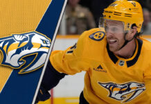 Nashville Predators forward Jonathan Marchessault looks on during a game wondering about the latest NHL trade rumors