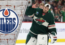 Marc-Andre Fleury waving thanks in his goalie gear, amidst swirling NHL rumors of a potential Edmonton Oilers comeback.