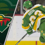 Minnesota Wild center Marco Rossi skating in a game, representing the current contract dispute and NHL trade rumors
