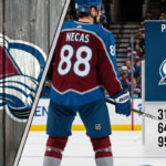 Martin Necas Point Projections 2025-26: Can He Crack 100 with the Avs? Martin Necas of the Colorado Avalanche stands at center ice, wearing his #88 jersey. A graphic overlay details his 2025-26 projected stats: 31 goals, 64 assists, and 95 points.