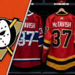 Cracks in the Foundation: Top Insider Reveals Mason McTavish’s Frustration in Anaheim Three custom hockey jerseys—Montreal Canadiens, Calgary Flames, and Buffalo Sabres—all with the name McTavish and the number 37 on the back, hang in an NHL dressing room, illustrating potential trade destinations.