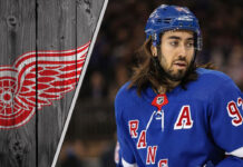 New York Rangers center Mika Zibanejad skates during an NHL game, central to recent Detroit Red Wings trade rumors.