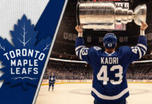 A realistic, widescreen image of Nazem Kadri in a Toronto Maple Leafs jersey, hoisting the Stanley Cup at center ice.