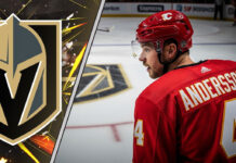 Calgary Flames defenseman Rasmus Andersson (4) looks towards the Vegas Golden Knights logo at center ice amidst NHL trade rumors.