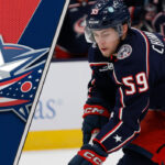 Columbus Blue Jackets forward Yegor Chinakhov skating during a game, amidst rumors of a trade request.