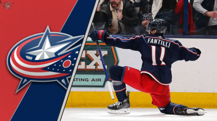Columbus Blue Jackets center Adam Fantilli celebrates a goal, illustrating the latest Adam Fantilli news regarding his contract negotiations.