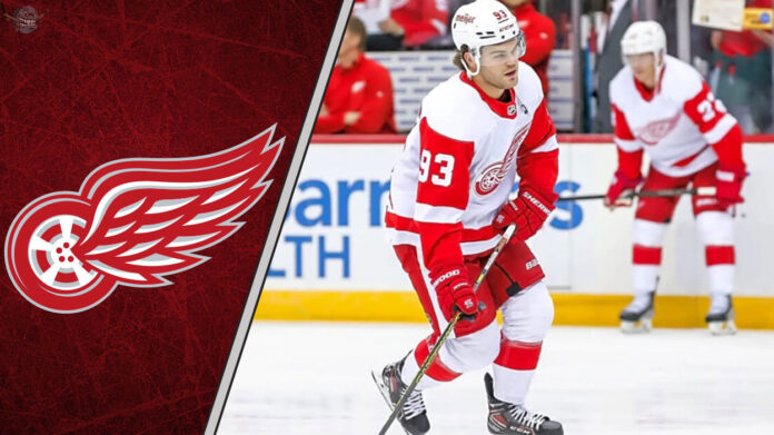 DeBrincat's 2025-26 Fantasy Hockey Draft Value Alex DeBrincat skating in his red Detroit Red Wings jersey, a key player for 2025-26 fantasy hockey point projections.