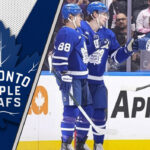 Toronto Maple Leafs celebrating a goal representing the team's hopes for the upcoming season