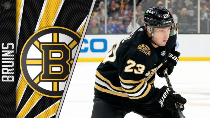 Why are the Boston Bruins Shopping Fabian Lysell? Boston Bruins forward Fabian Lysell skates with the puck during an NHL game, with the Boston Bruins logo visible in the background, representing the latest on Boston Bruins rumors.