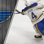 Buffalo Sabres defenseman Bowen Byram takes a shot on goal, amidst ongoing St. Louis Blues rumors