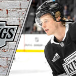 LA Kings defenseman Brandt Clarke skates with the puck during an NHL game