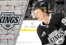 LA Kings defenseman Brandt Clarke skates with the puck during an NHL game