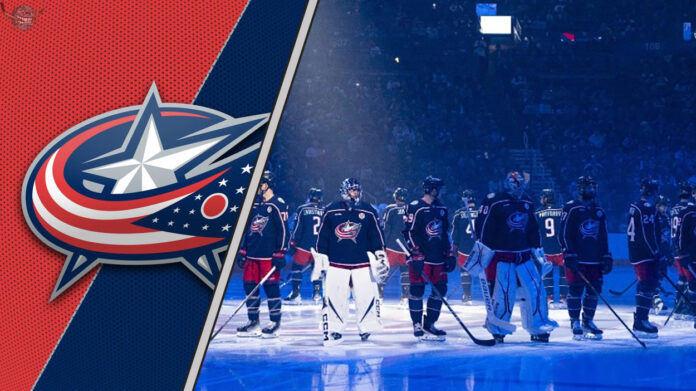 cbj-preseason-schedule-2025 Columbus Blue Jackets players standing on the ice during a preseason game