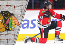 Chicago Blackhawks forward Frank Nazar skates with the puck during an NHL game.