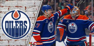 Edmonton Oilers captain Connor McDavid congratulates Stuart Skinner during a game as NHL trade rumors swirl around the team
