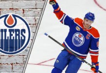 Edmonton Oilers captain Connor McDavid waving to the crowd